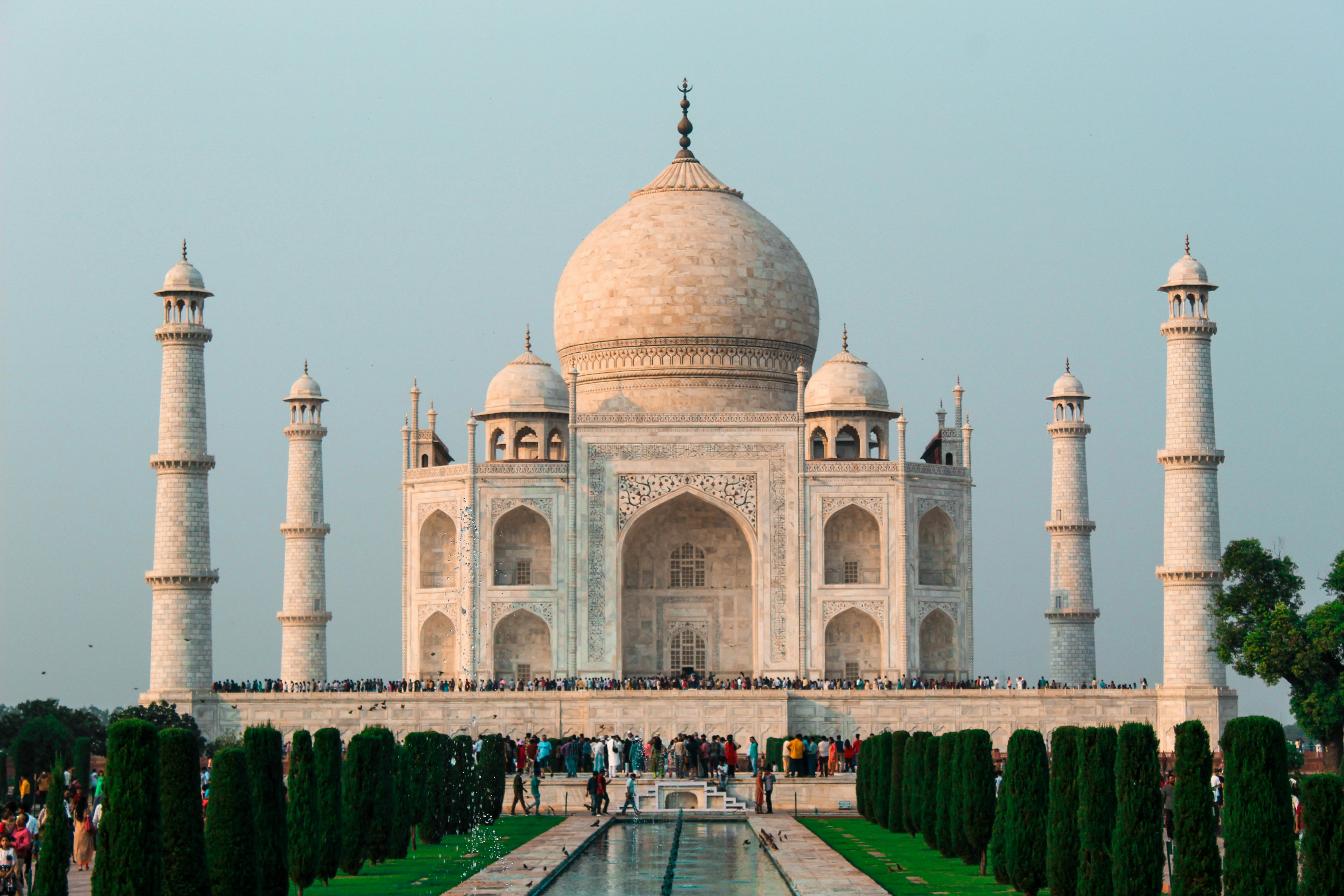 Taj Mahal white marble monument at sunrise in Agra