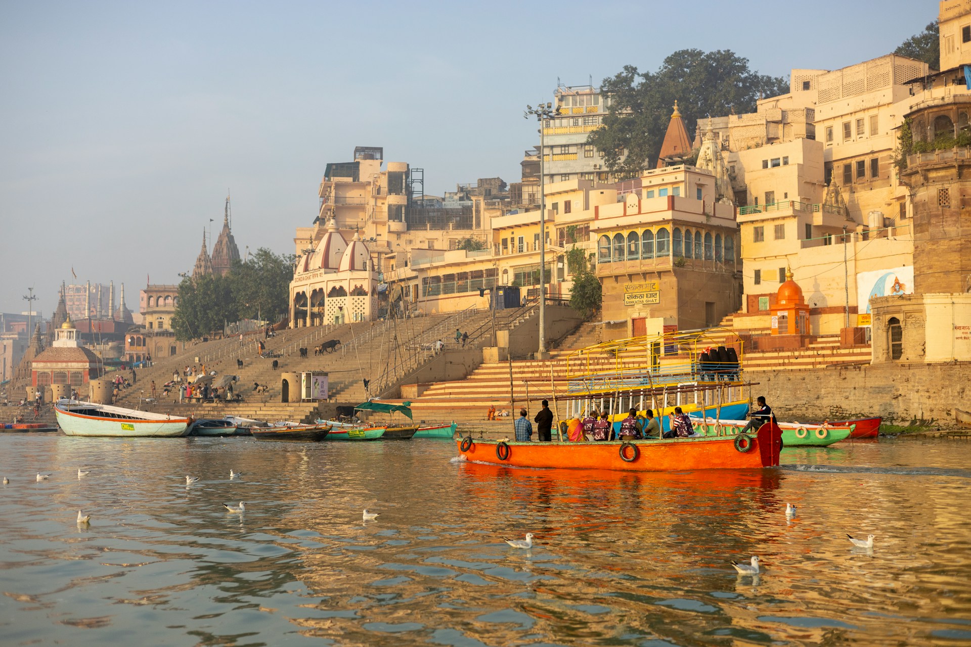 Varanasi ghats with evening Ganga Aarti lamps on the holy river